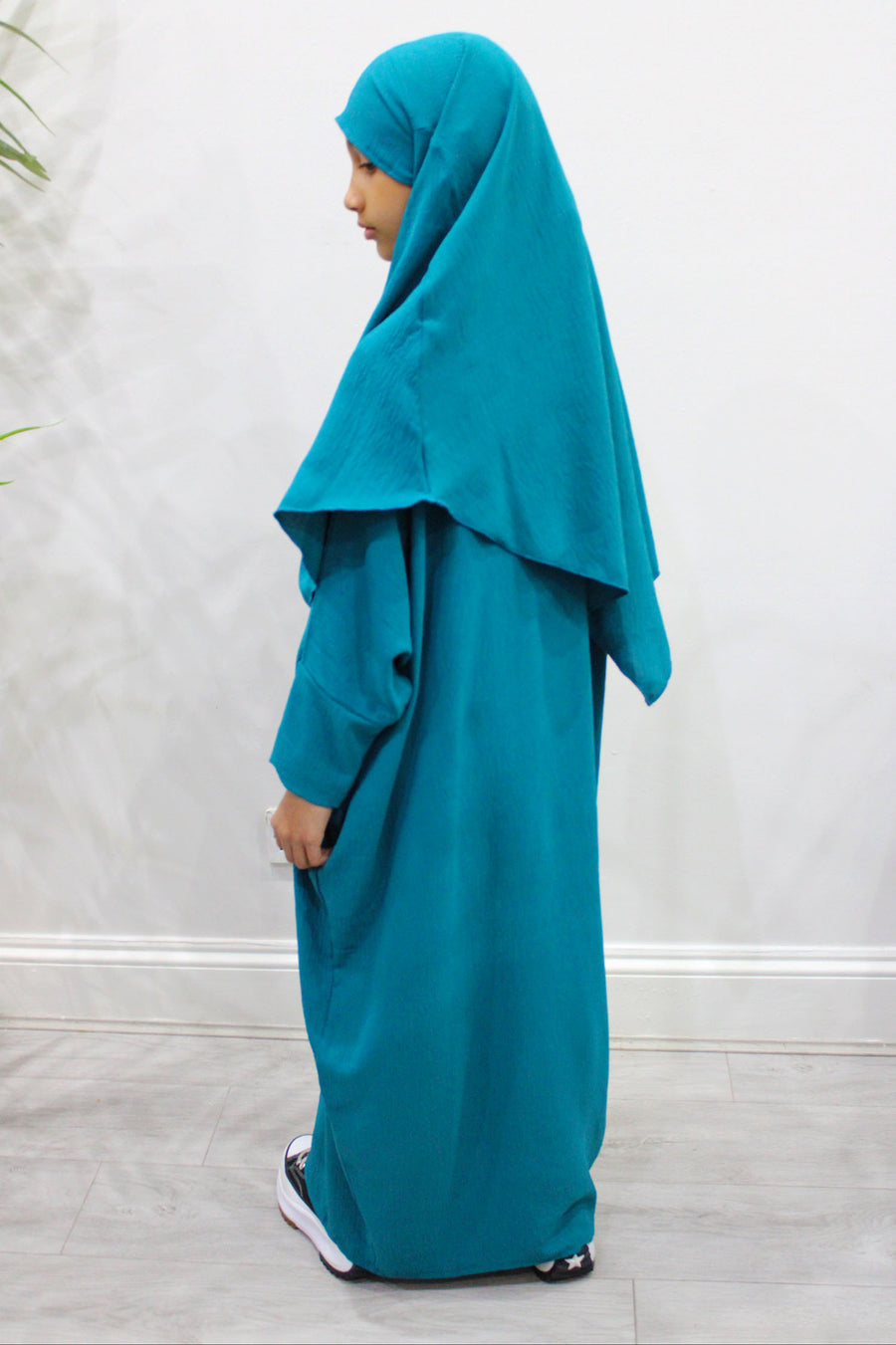 Back view of girls' dark turquoise abaya and khimar set