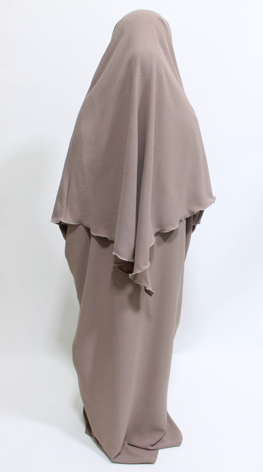 Mocha overhead abaya showing the loose fit and crepe drape