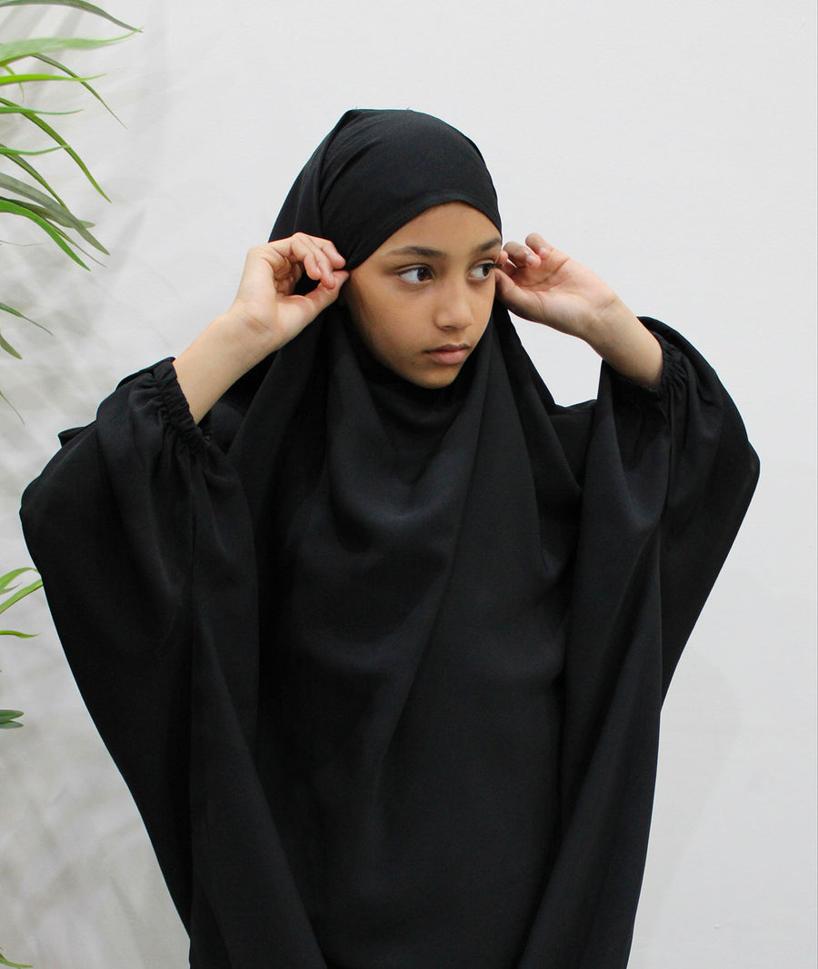 Back view of girls' black sarouel jilbab set showing full coverage