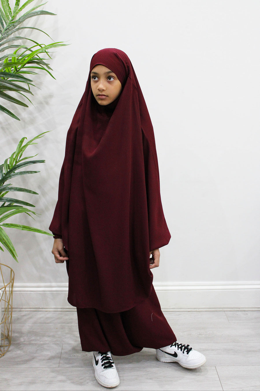 Back view of girls' maroon sarouel jilbab showing full coverage