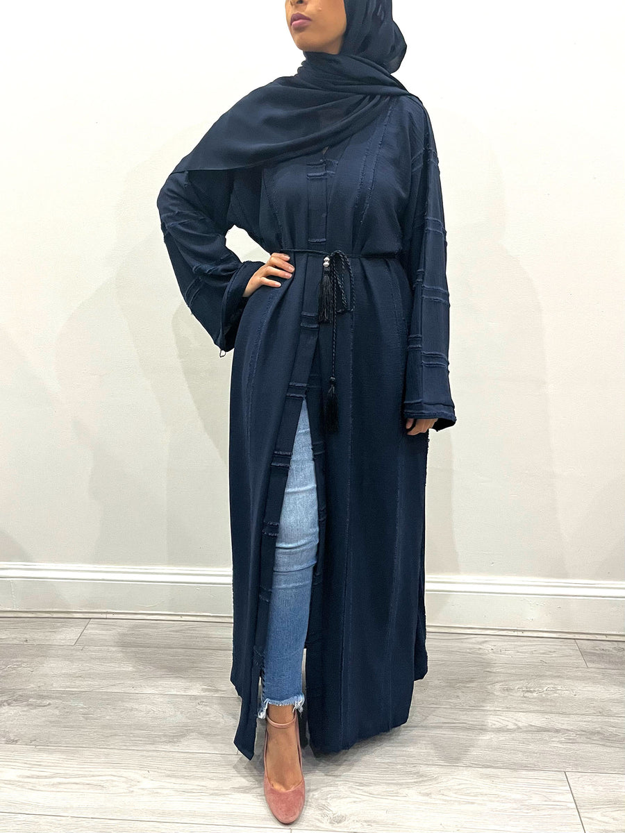 Navy abaya shown with its matching hijab and belt