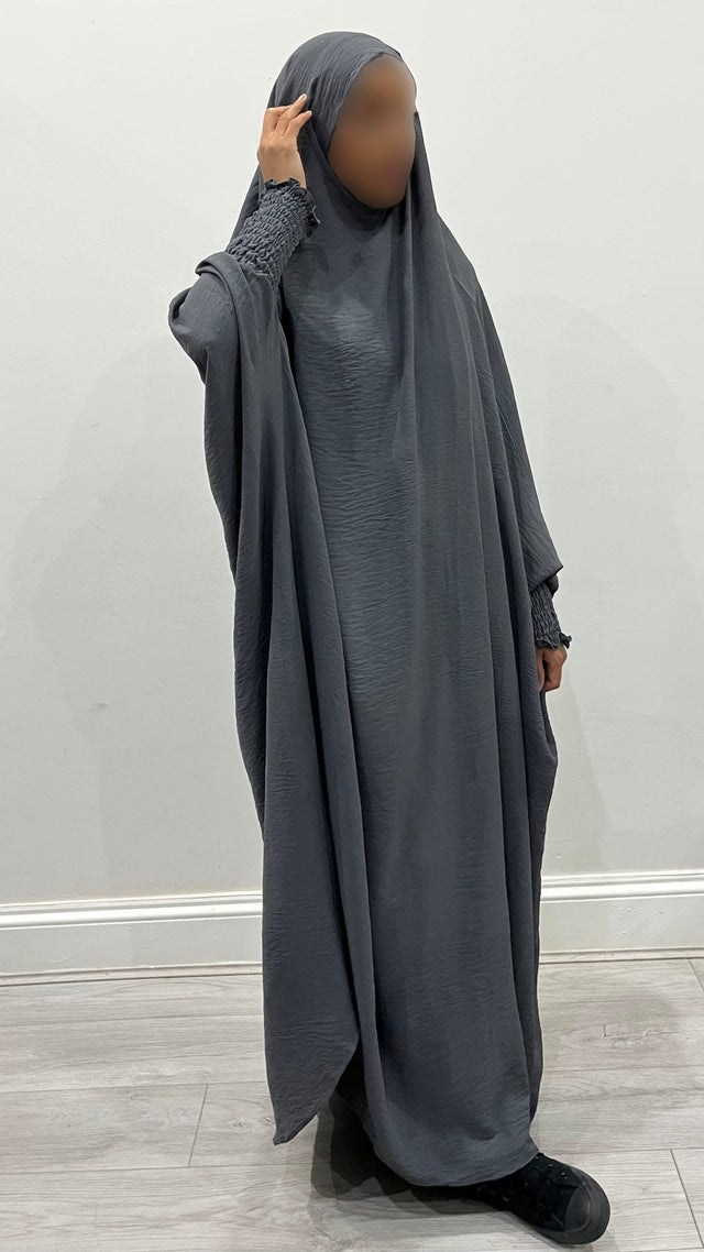 Dark grey one-piece overhead full jilbab with ruched cuffs, front view
