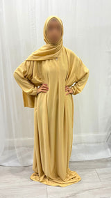 Soft yellow cotton stretch prayer dress with attached hijab, front view