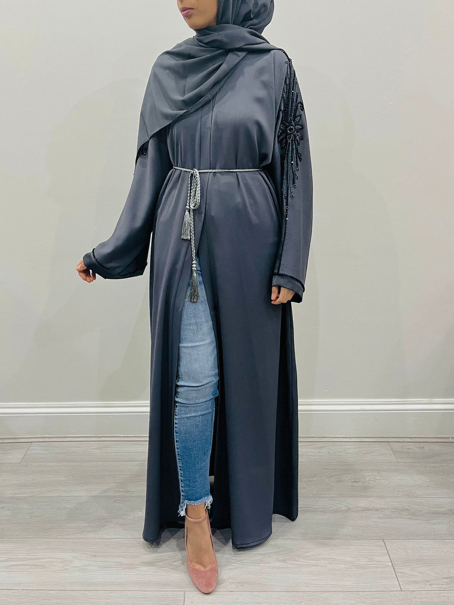 Slate gray abaya shown with its matching hijab and belt