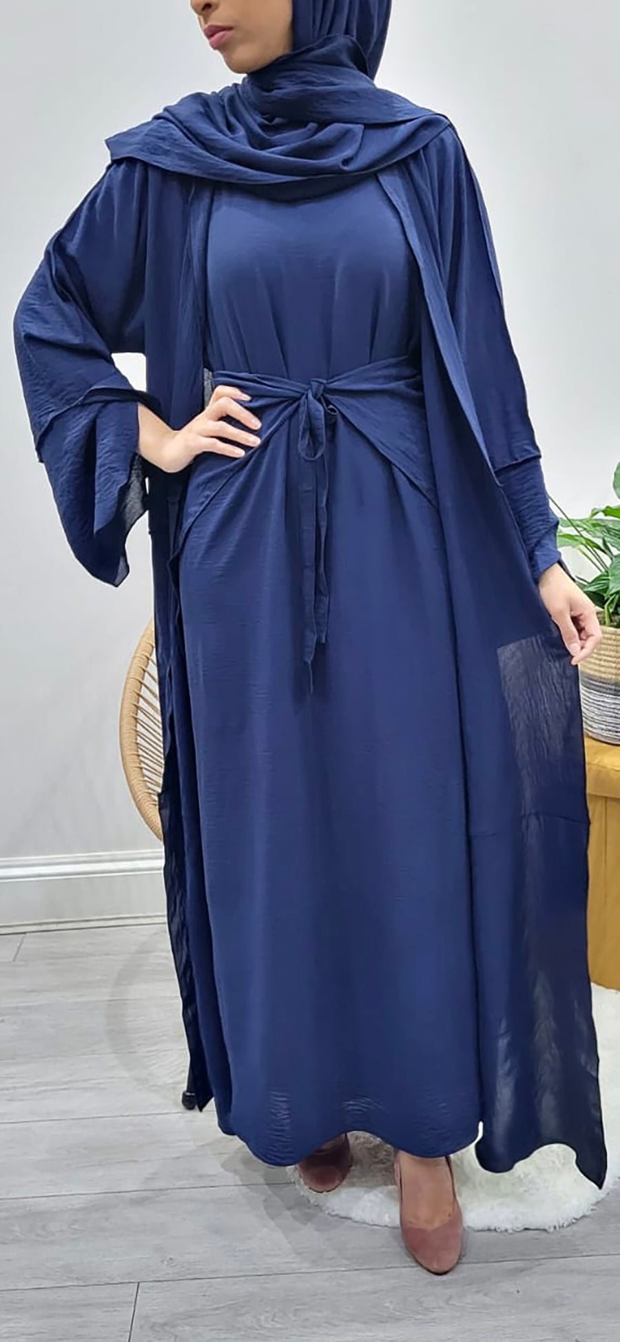 Navy three-piece abaya shown with its matching hijab