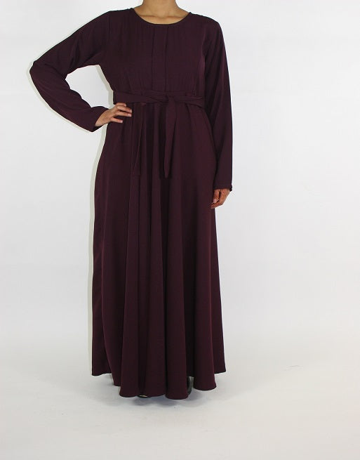 Side view of Amani's A-line pleated maxi dress