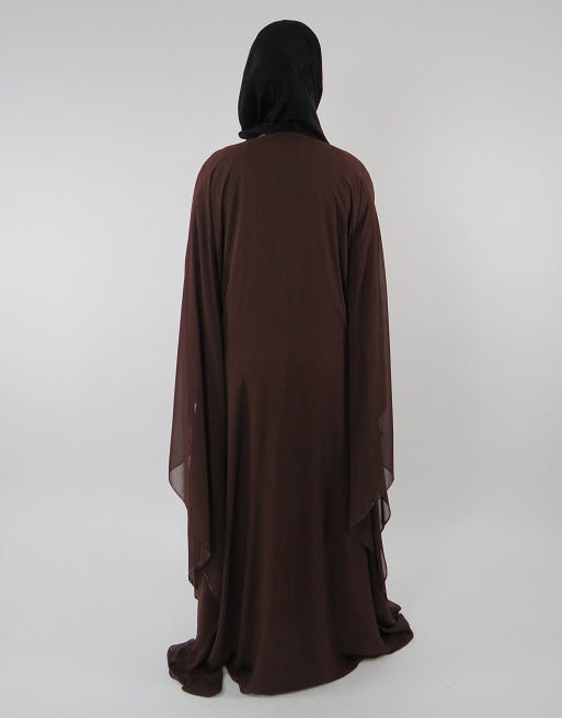 Brown farasha abaya showing flowy chiffon drape