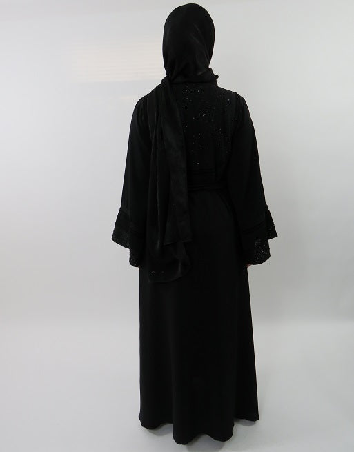 A-line umbrella cut black abaya showing full sweep