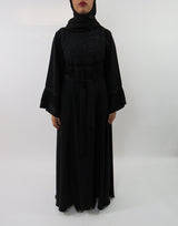 Black on black embellished umbrella cut abaya, front view