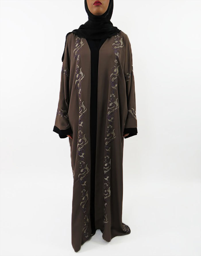 Neda abaya showing Asian-inspired embroidery and wide sleeves