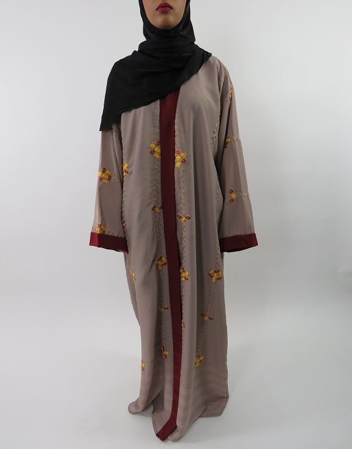 Burgundy open abaya with golden swirl embroidery and V-neckline, front view
