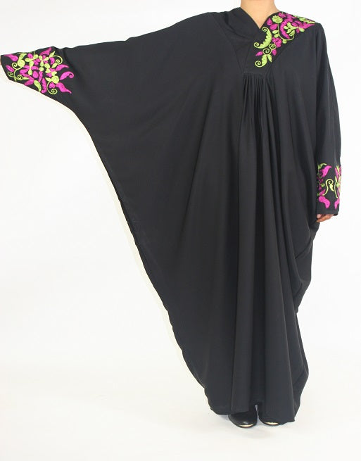 Closed abaya showing intricate colourful floral embroidery