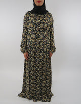 Amani's long sleeve maxi dress with side pockets front view