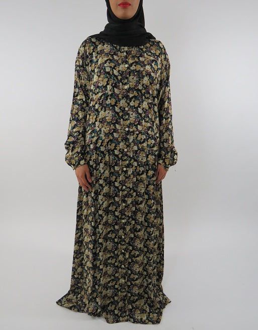 Amani's long sleeve maxi dress with side pockets front view