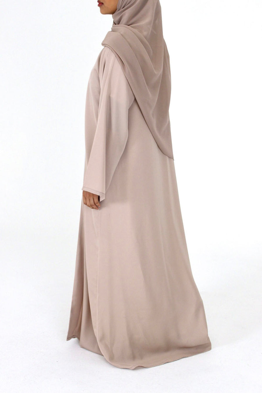 Beige duster abaya shown with its matching scarf