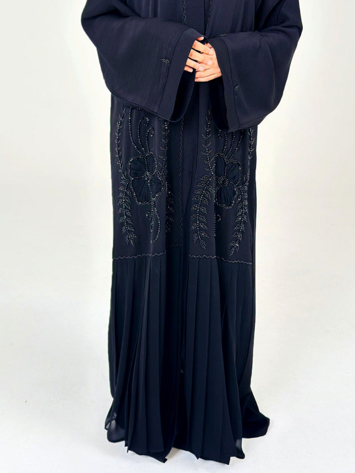 Black embellished abaya shown with its matching scarf and belt