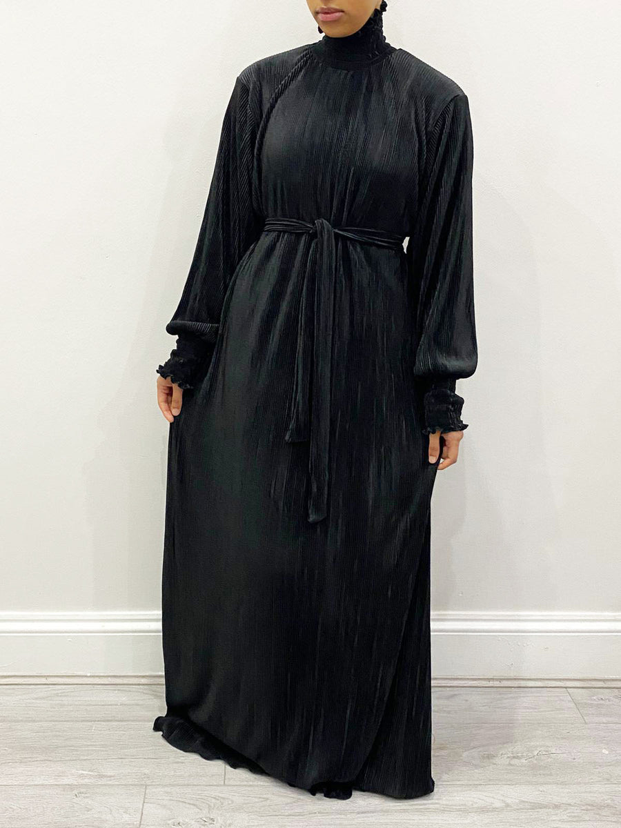 Black pleated satin turtleneck maxi dress, full-length front view