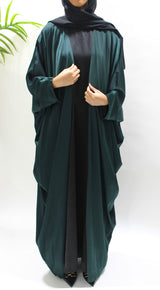 Woman wearing Amani's bottle green farasha abaya set with matching hijab