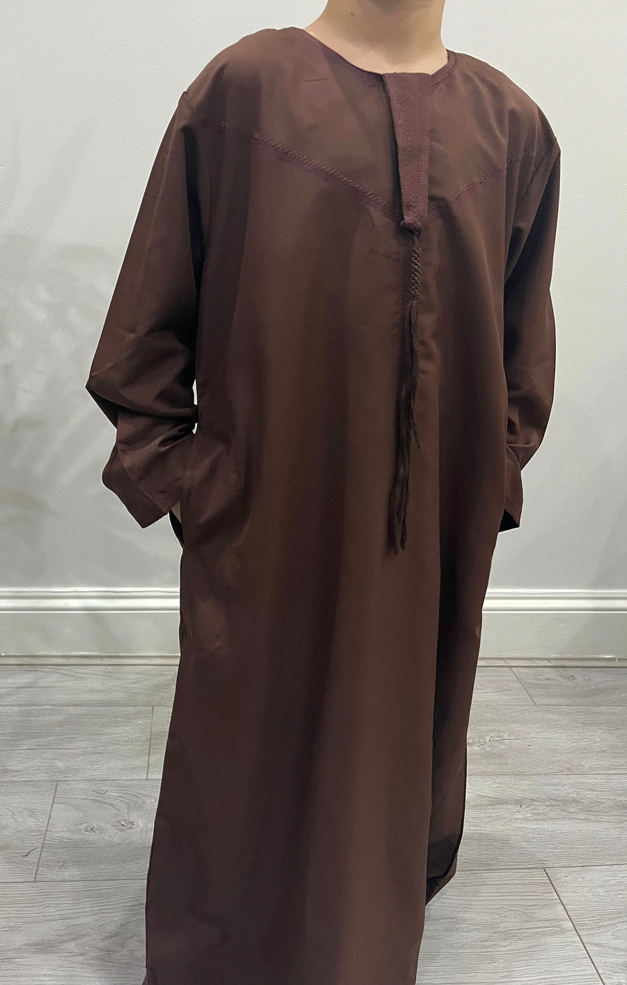 Boys chocolate Emirati thobe with removable tassel detail