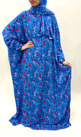 Bright blue cotton floral prayer dress with attached hijab, front view
