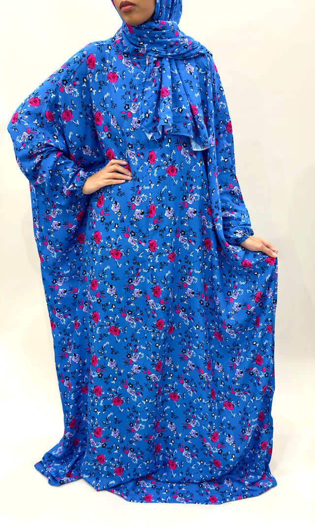Bright blue cotton floral prayer dress with attached hijab, front view
