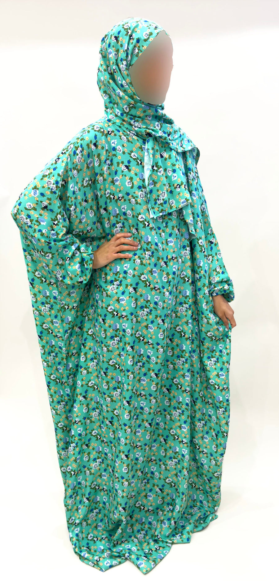 Persian green floral prayer dress showing the print and elasticated cuffs