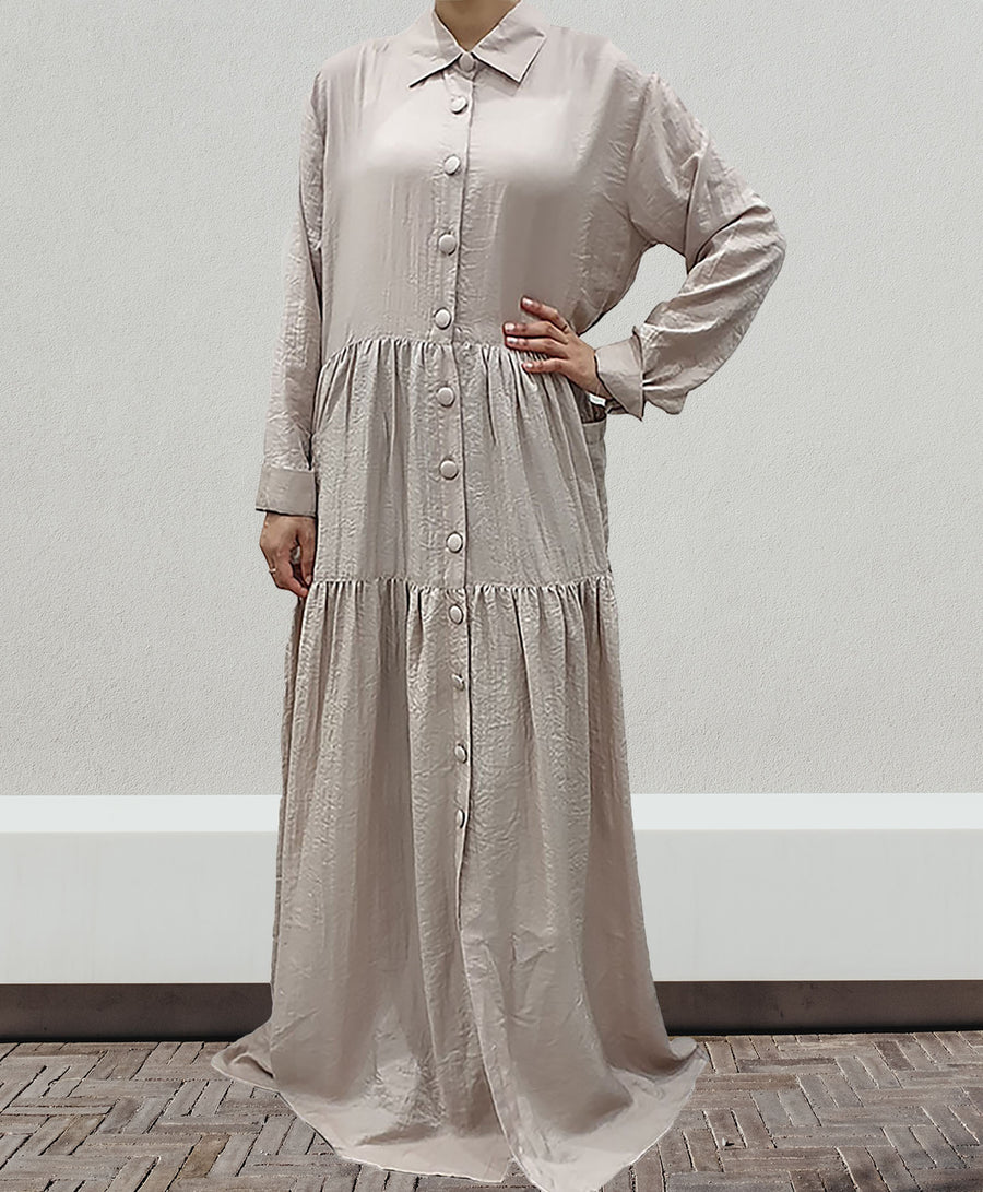 Amani's taupe shirt dress with front pockets front view