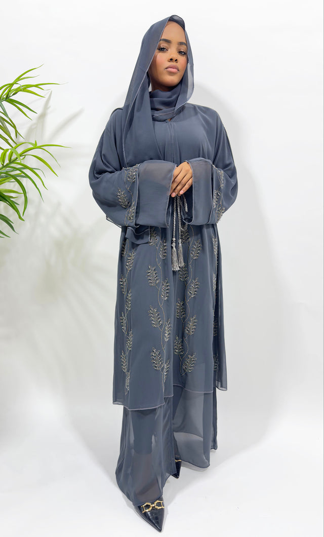 Woman wearing Amani's grey double chiffon embellished open abaya