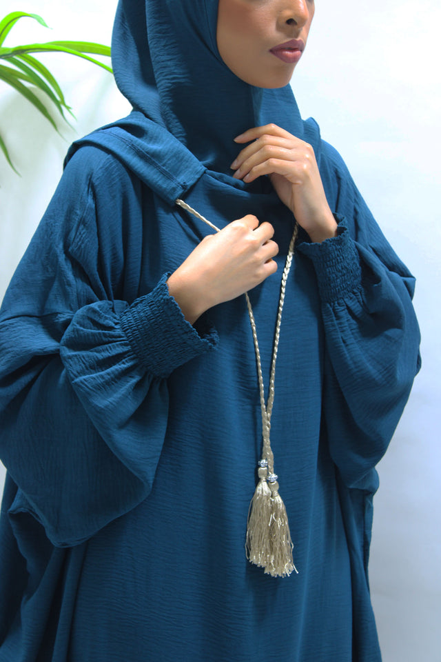 Teal double hooded prayer abaya, front view