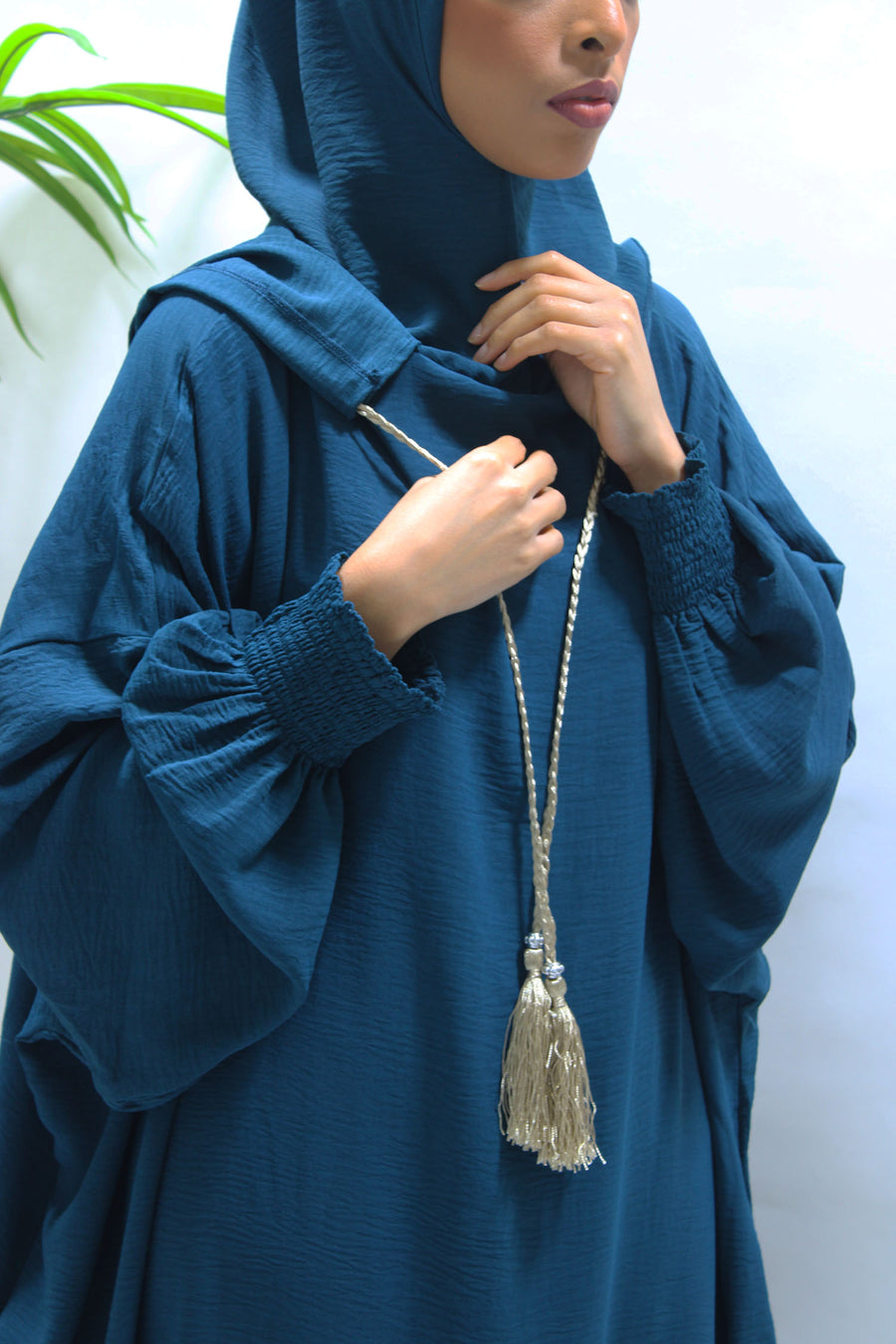 Teal double hooded prayer abaya, front view
