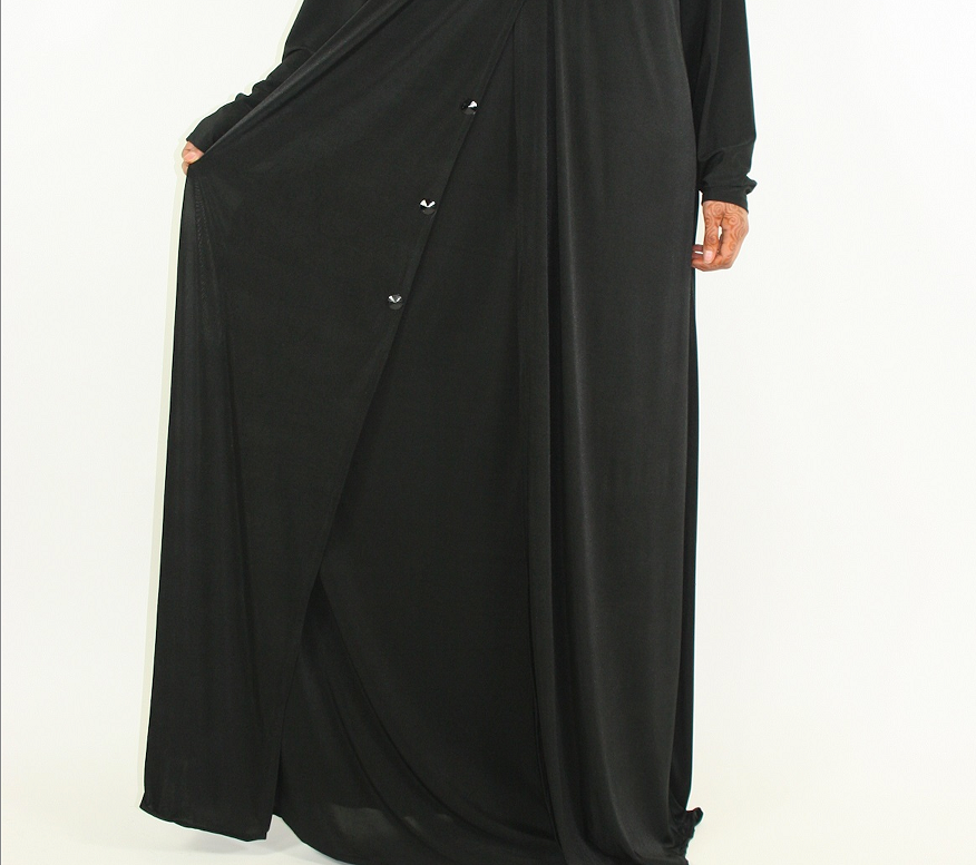 Black jersey abaya showing the satin flap and layered effect