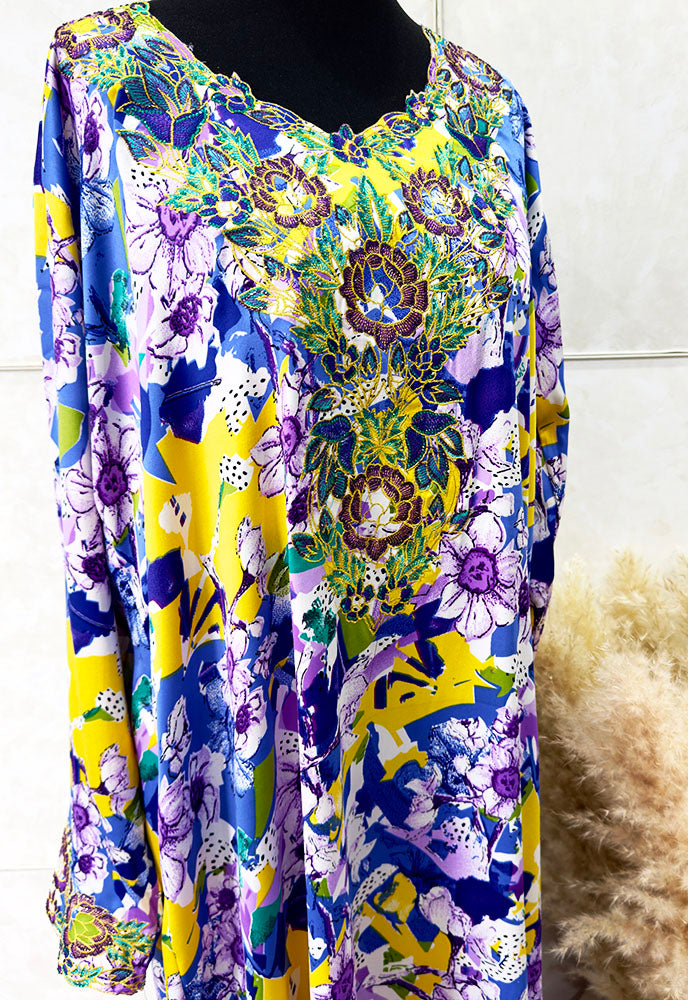 Embroidery and crystal cut-work neckline on the multi floral mukhawar dress