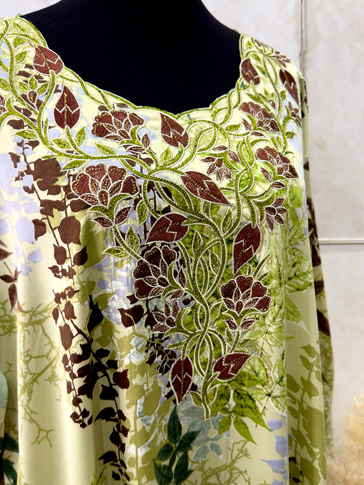 Brown and green mukhawar showing floral embroidery detail