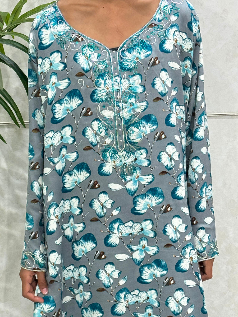 Embroidery and crystal neckline detail on the Mykonos blue mukhawar dress