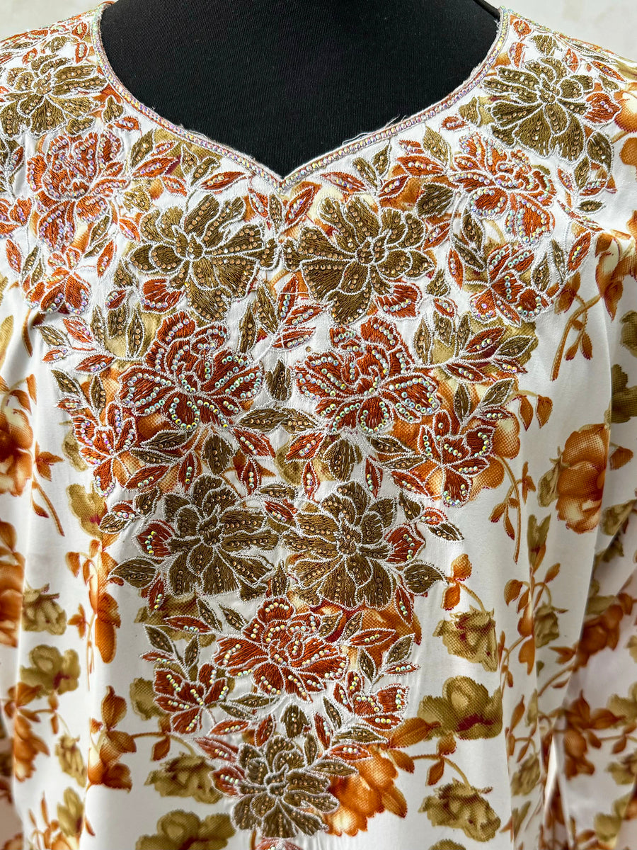 Embroidery and crystal neckline on the ocher orange girls' mukhawar dress