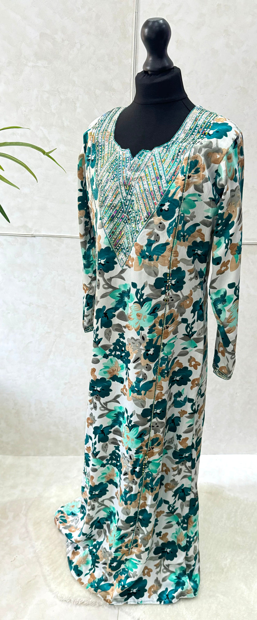 Girls' teal floral mukhawar dress, front view