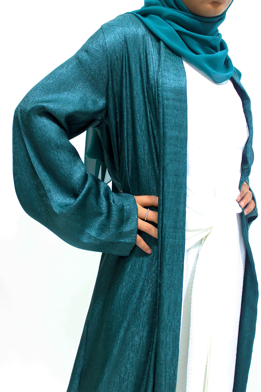 Dark teal open jacket abaya showing the shimmer-textured fabric
