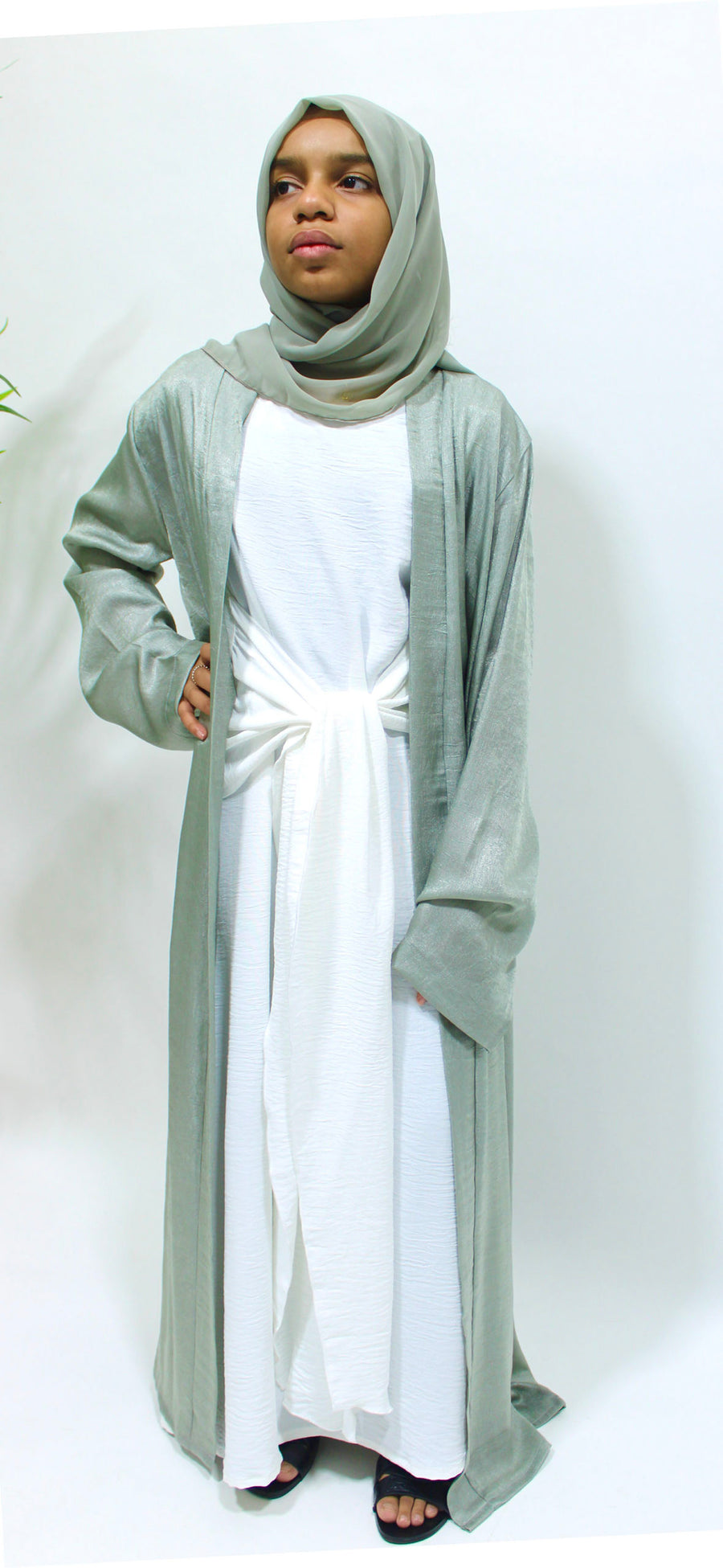 Matching kids' scarf with the sage green abaya set
