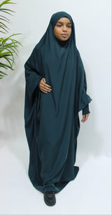 Girl wearing Amani's deep teal ruched cuffs full jilbab