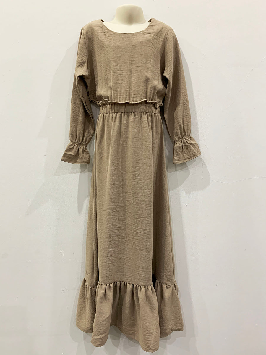 Sand maxi dress styled for everyday wear