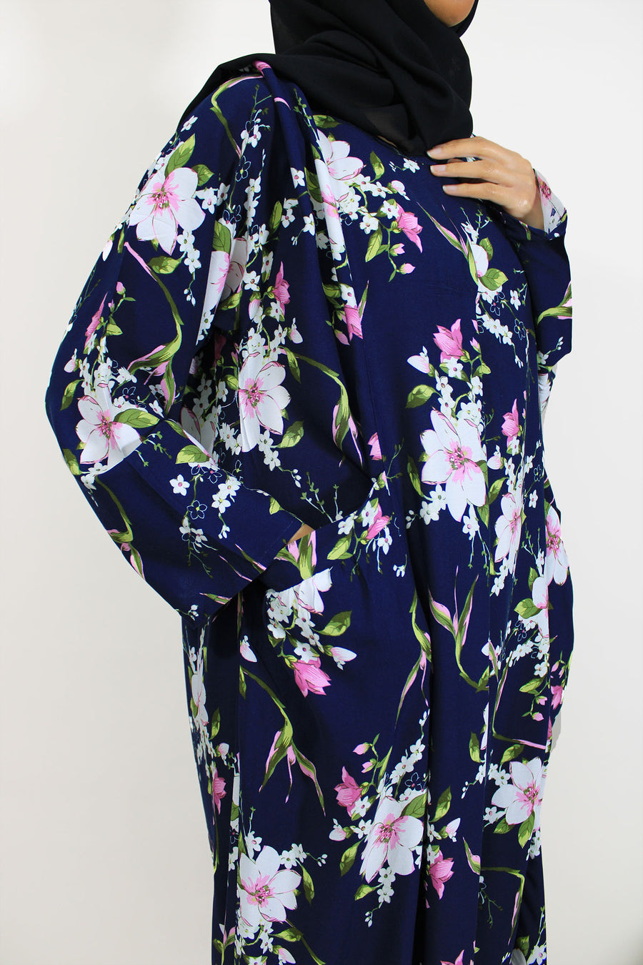 Navy floral maxi dress showing the relaxed flowing fit