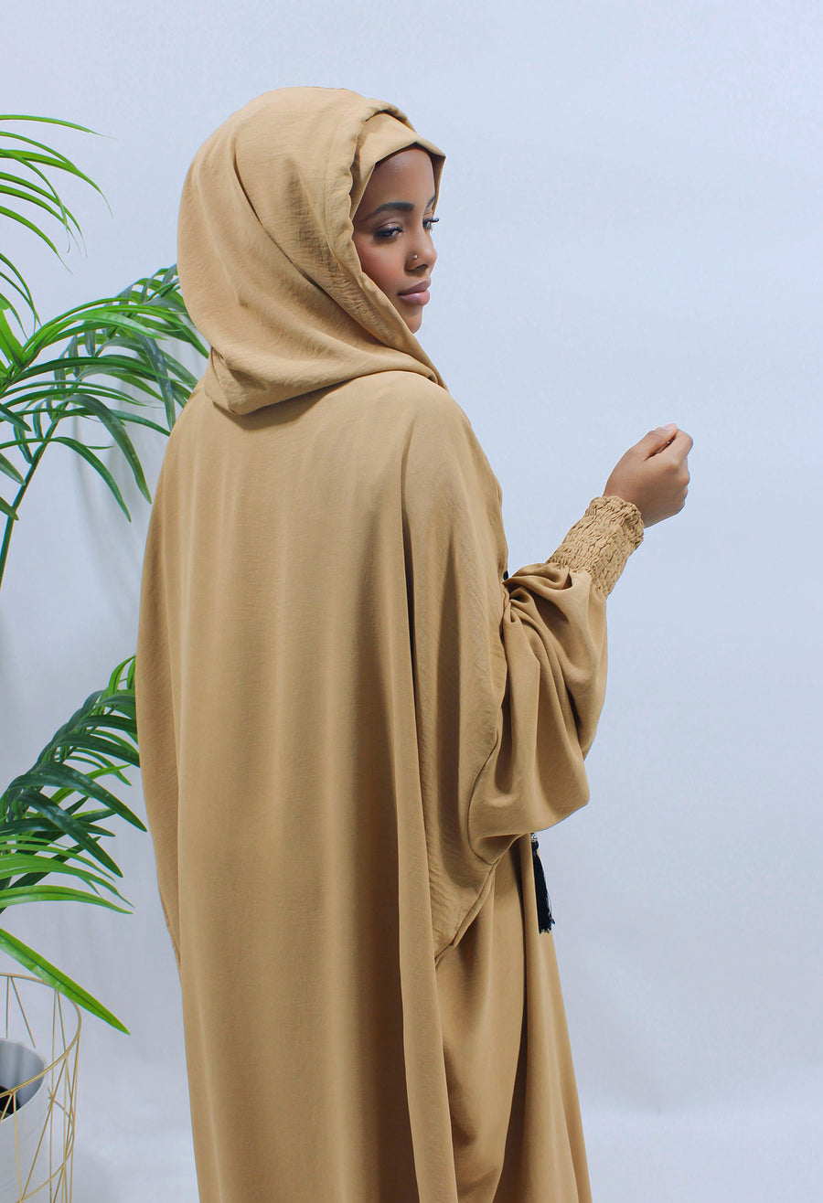 Close view of the elasticated ruched cuff on the mustard prayer abaya
