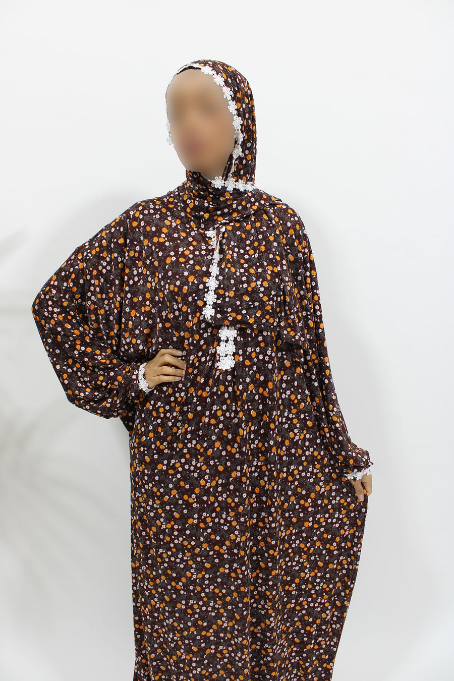 Chocolate floral prayer dress showing the lace trim and attached hijab