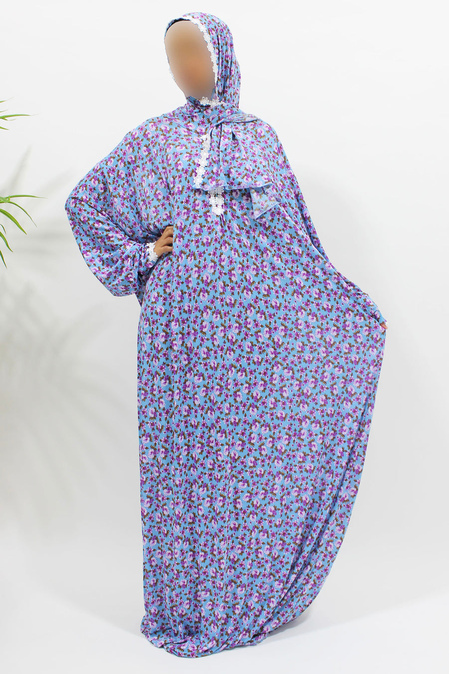 Light blue floral prayer dress showing the lace trim detail
