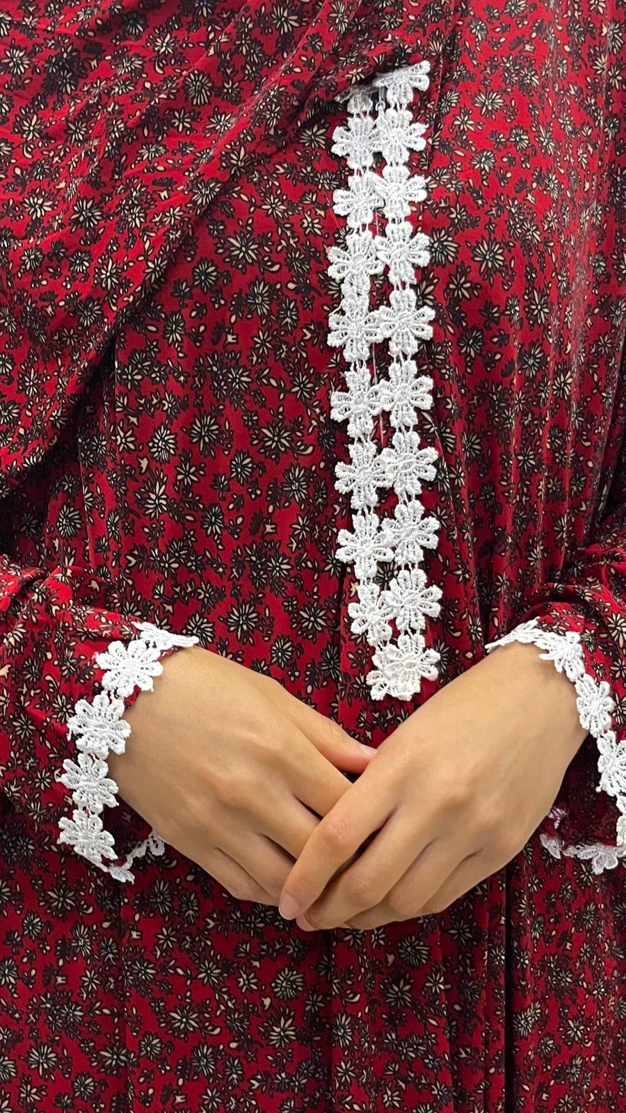 Red floral prayer dress showing the attached hijab and full length