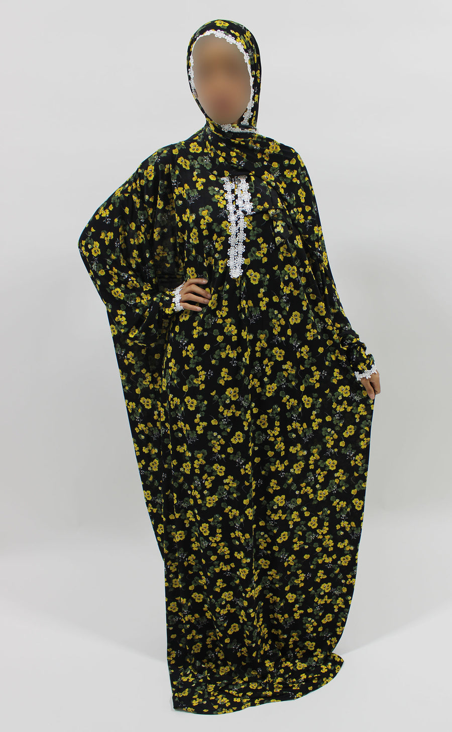 Yellow floral prayer dress showing the lace trim detail