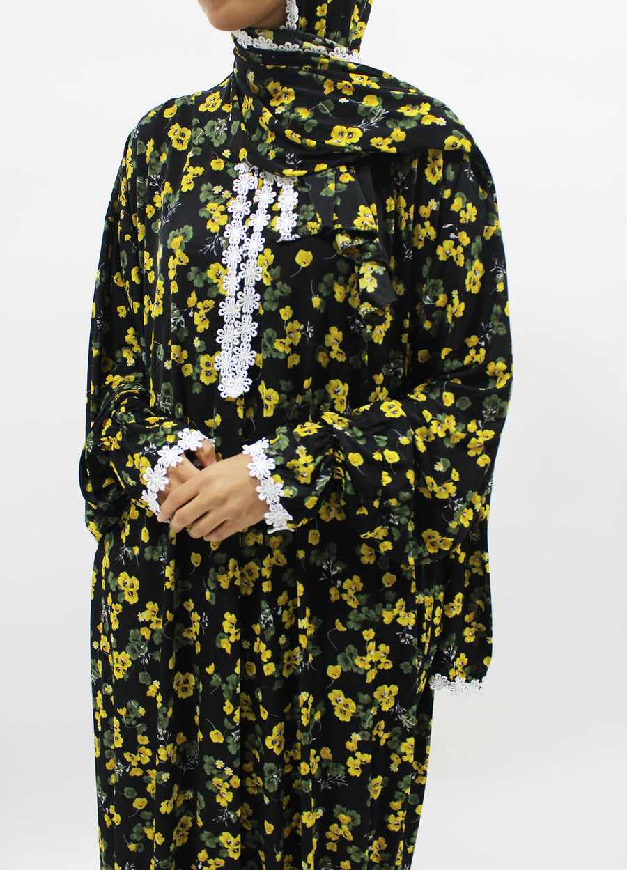 Yellow floral prayer dress showing the attached hijab and full length