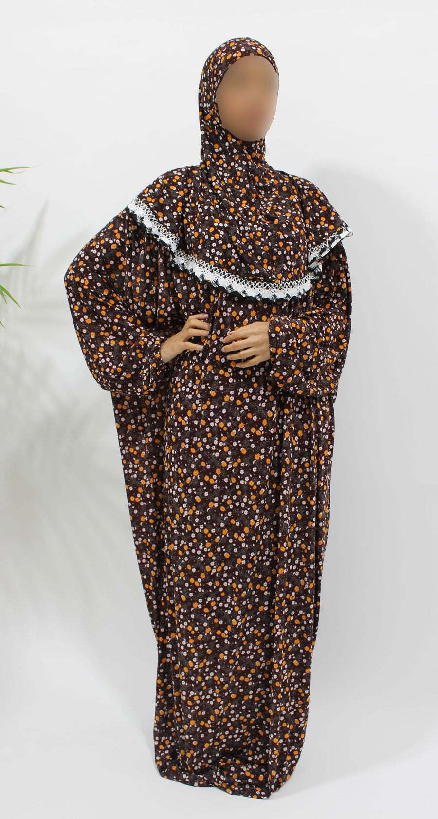 Chocolate floral jersey prayer dress showing the attached hijab