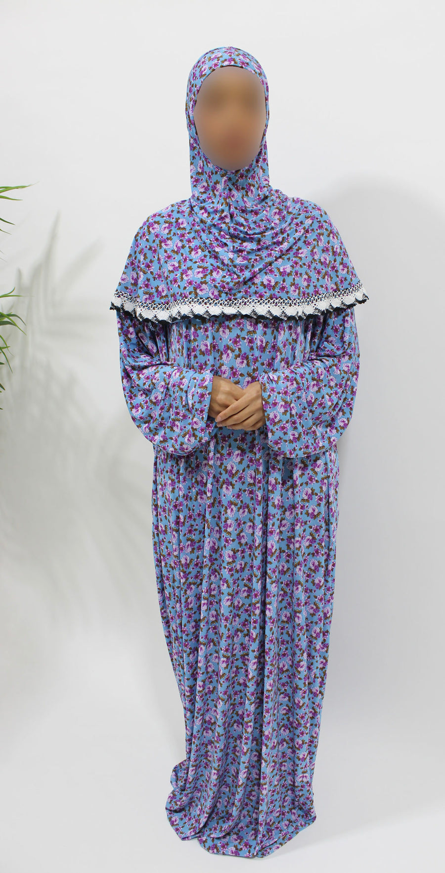 Light blue floral jersey prayer dress showing the attached hijab