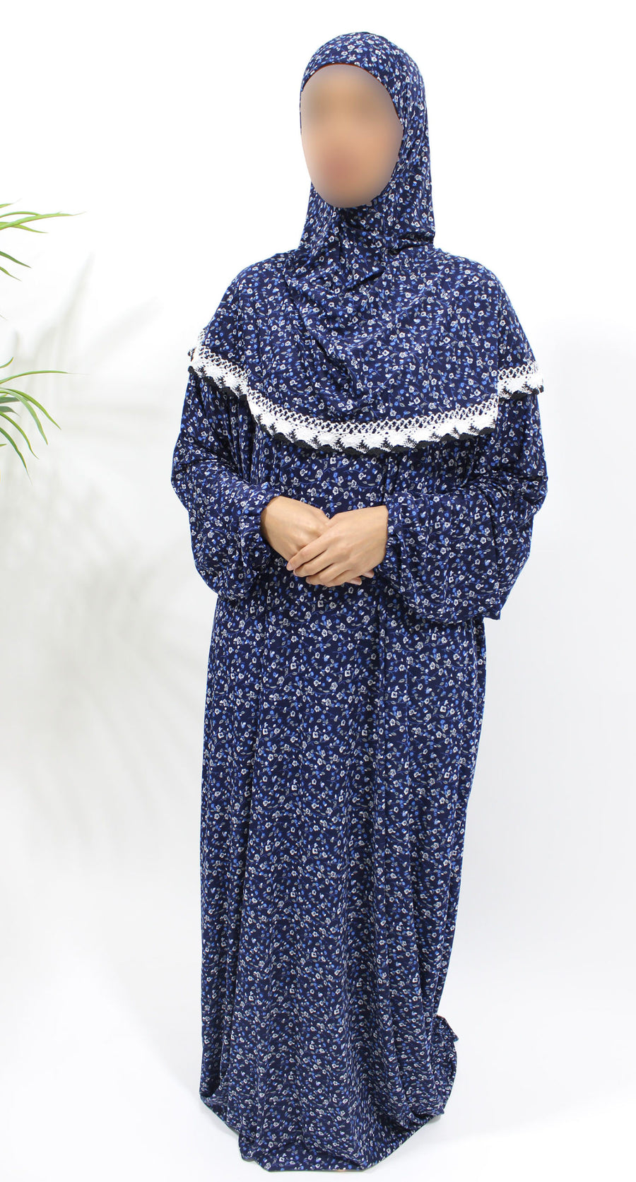Navy blue floral jersey prayer dress showing the attached hijab